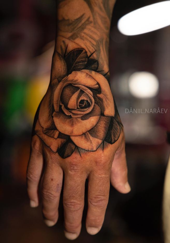 Awesome Hand Flower Tattoo